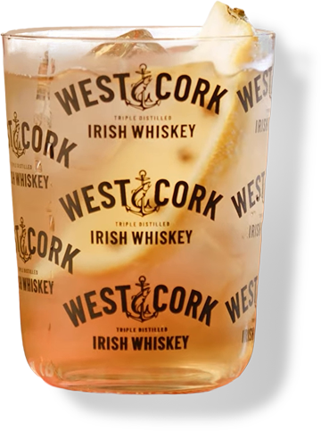 West Cork Iced Toddy served in a glass with ice and lemon