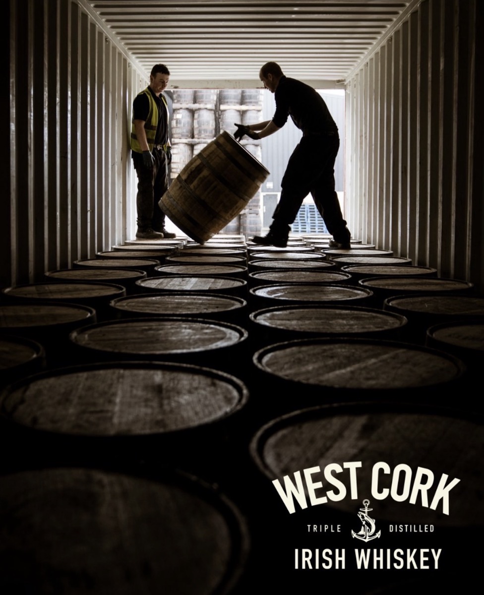 A cask being rolled into the West Cork Distillers warehouse, ready for filling